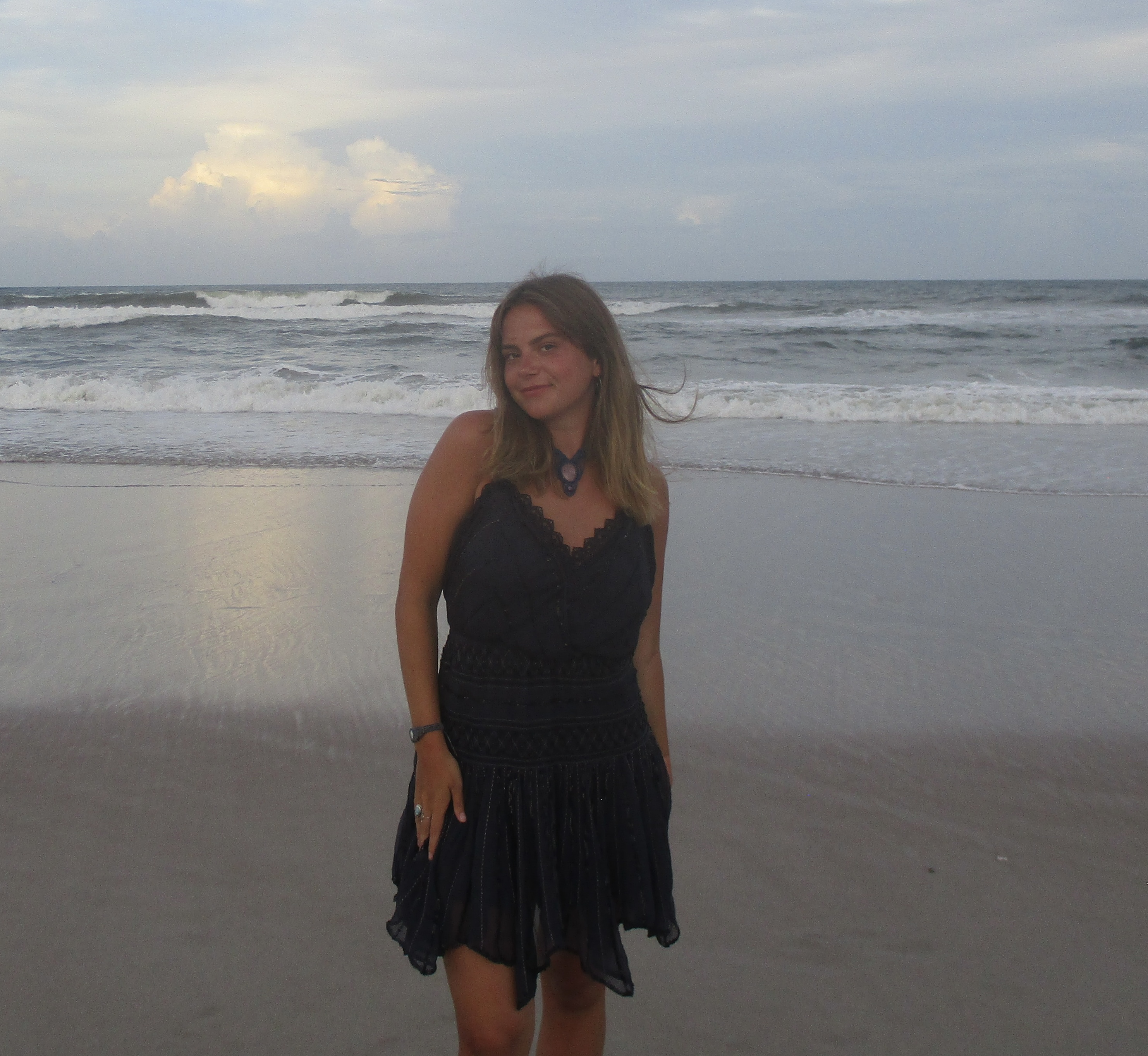 Kat Steckel standing on the beach